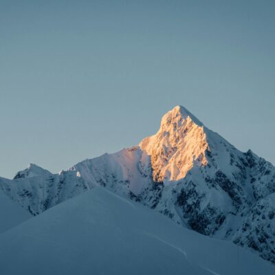 snow covered mountain under blue sky during daytime