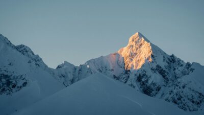 snow covered mountain under blue sky during daytime